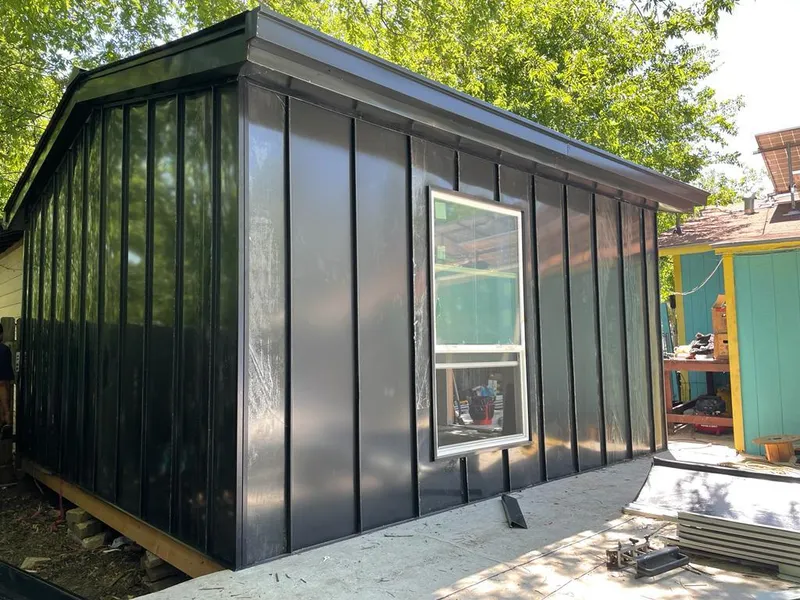 Black standing seam metal wall panels for Metal Roof Installation in Sparta